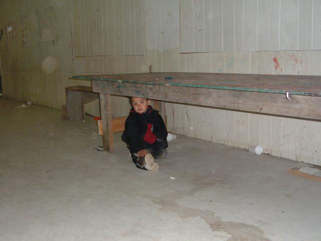 Little tyke under the table