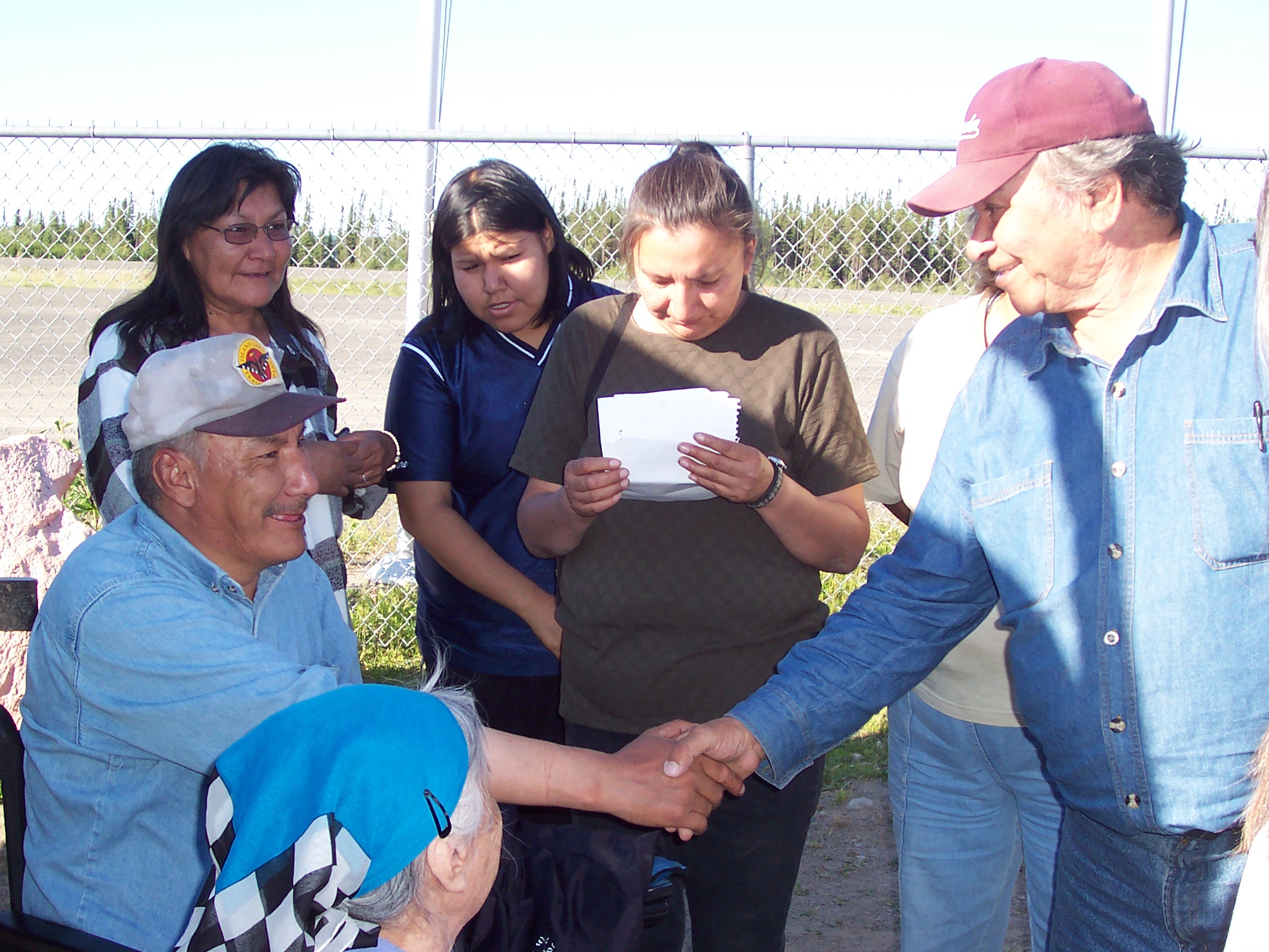 Our Chief Isaac Linklater, shakes Bob's hand.