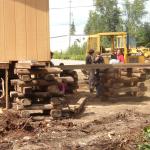 July 28. Here they are starting to jack up the building.