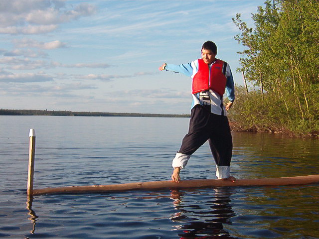 Kenese Rae, made it looks so easy.  He was the one who almost made it to the end of the log.  He won seventy five dollars.  :-)
