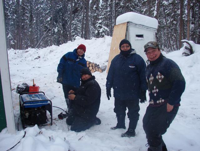 Community members Jessilyn Meekis, Augustine Rae, Joy Keewaykapow, and Micheal Rae.
