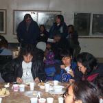 As a few of the community members taking in the food.